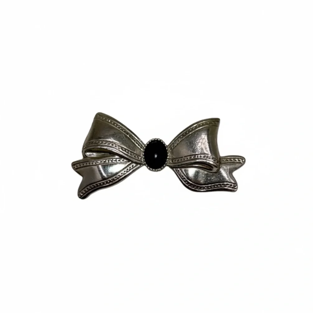 Silver Tone Bow Brooch with Black Center